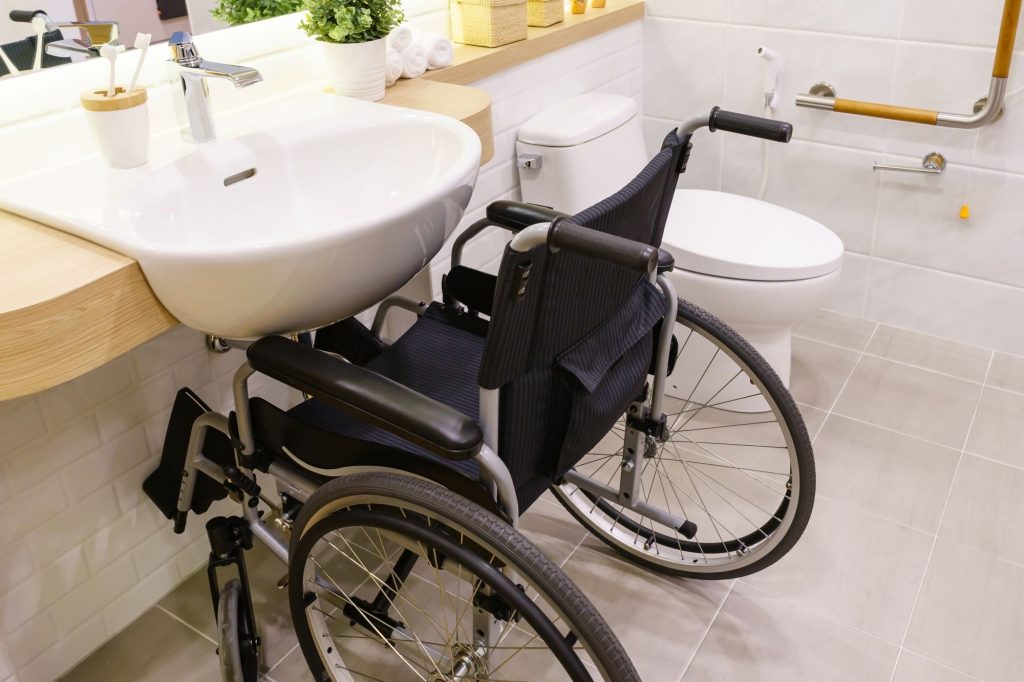 wheelchair in an accessible bathroom