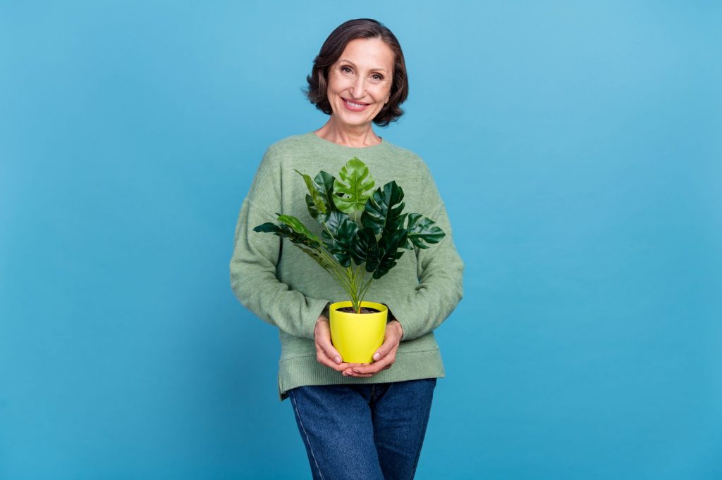 woman with houseplant