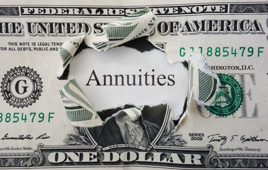 What are annuities? Dollar bill with the word "annuities" in the middle of the George Washington head