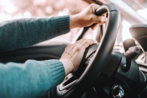 hands on steering wheel Convince an Elderly Parent to Stop Driving