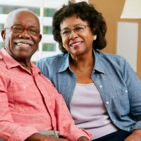 senior couple wearing eyeglasses