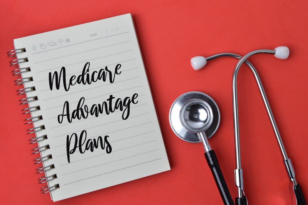 Medicare Advantage Plans written on a notebook