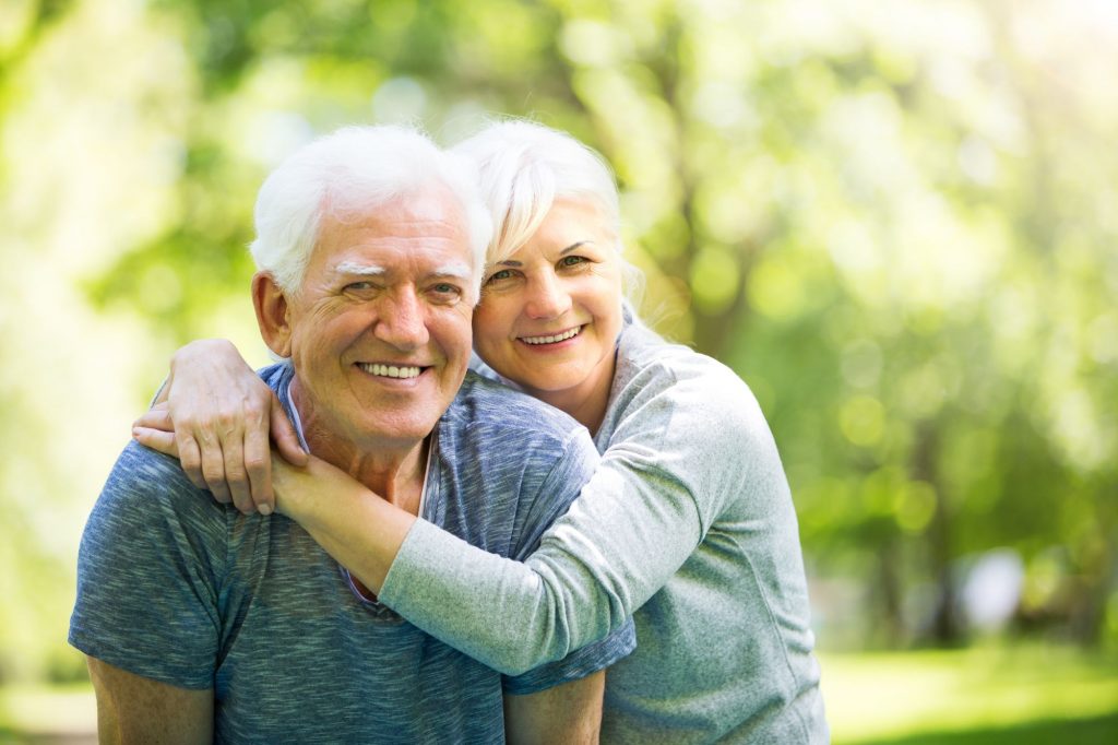 smiling senior housing help couple