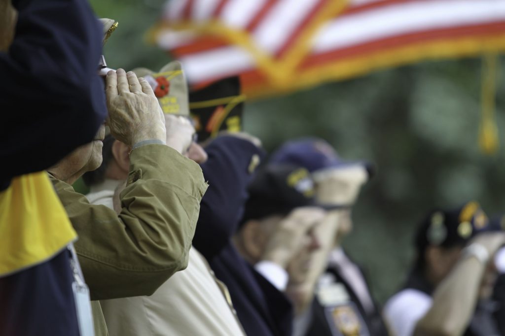 ways to pay for long-term care, veteran benefits, senior veterans saluting