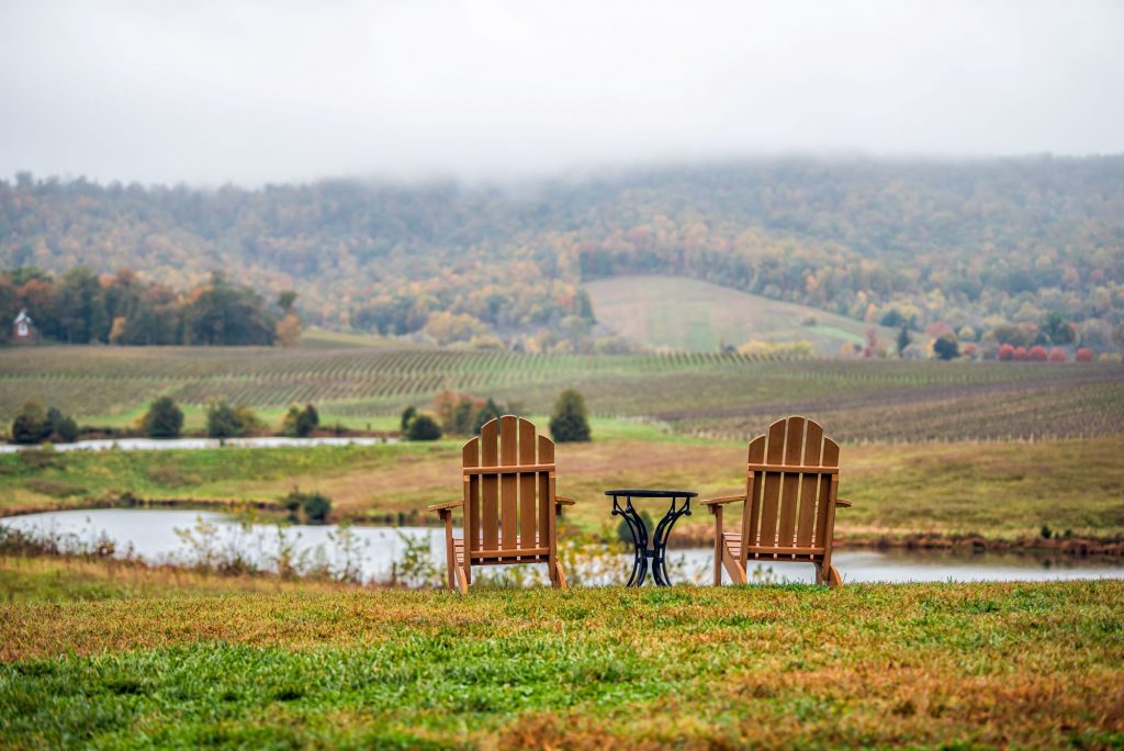 two chairs by a pond in Charlottesville, Virginia