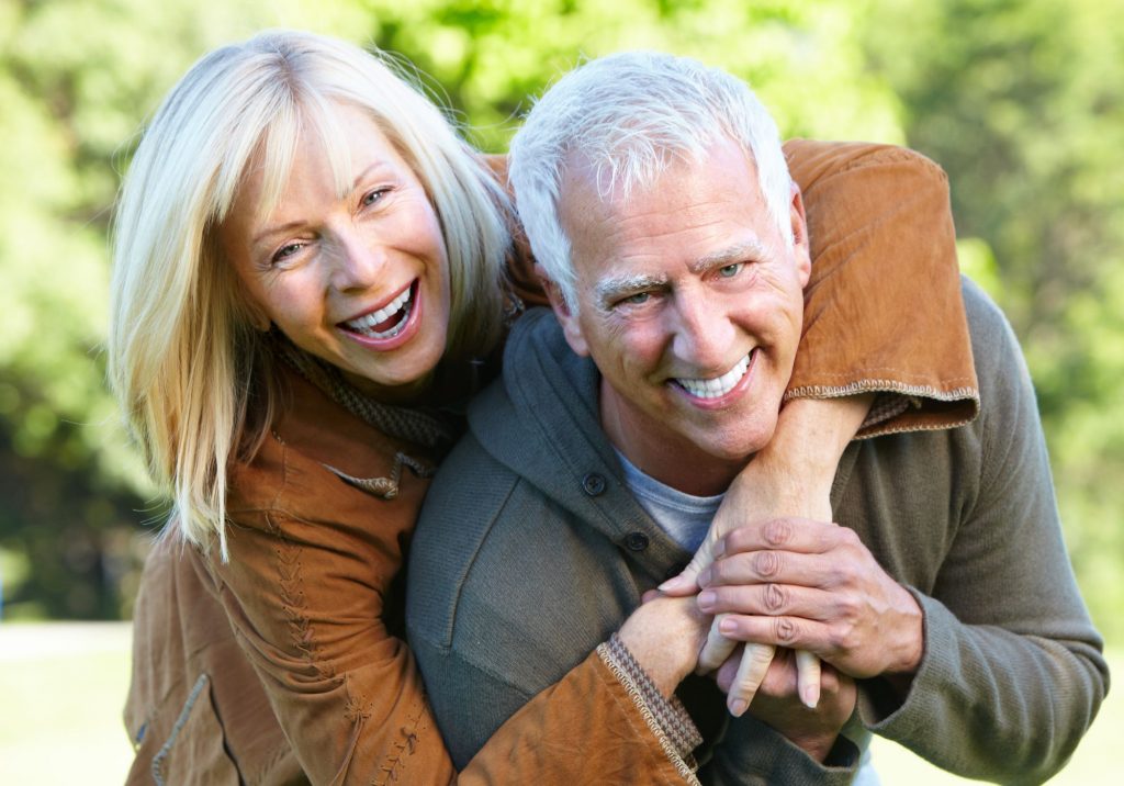 How to Choose a 55-Plus Active Adult Community retired couple smiling