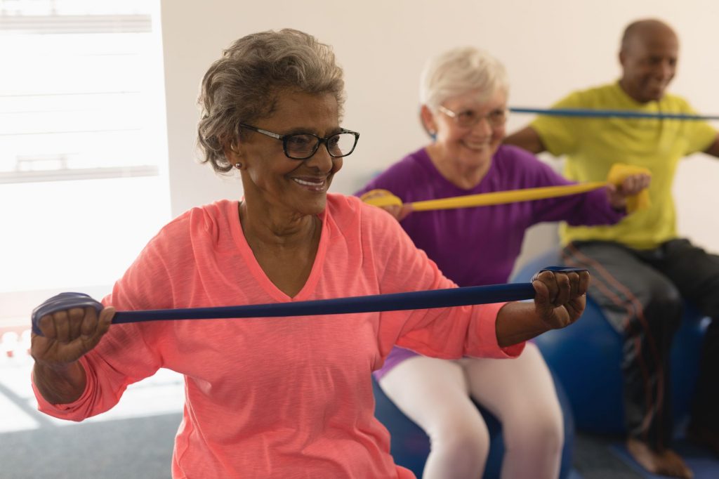 Aging seniors enjoying an exercise session.