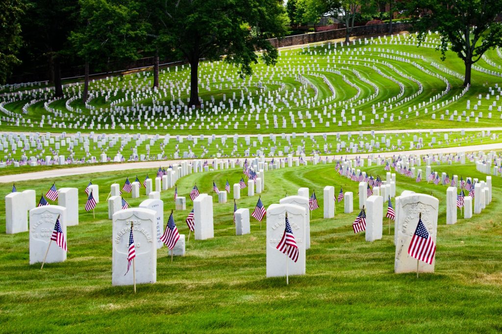 visiting a cemetery to honor senior veterans