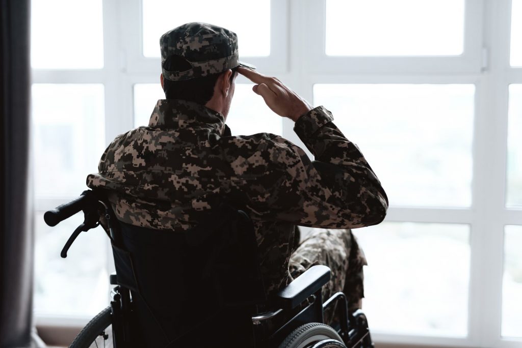 disabled veteran saluting and applying for VA Disability Compensation
