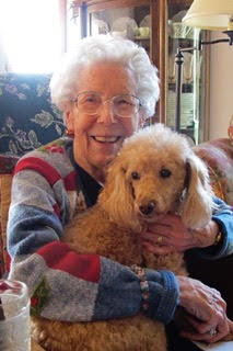 Abby the dog with Penney Hubbard's mother in an Alzheimer's facility