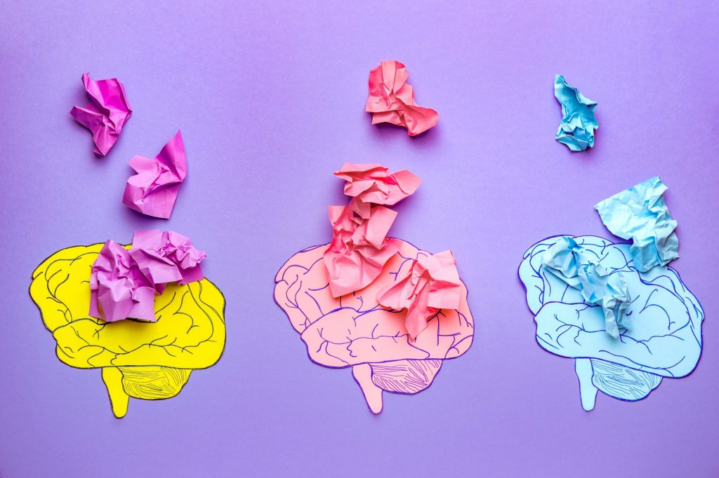 three brains with crumbled paper, dementia, FTD concept art