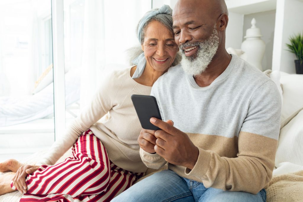 African American senior couple on the pone