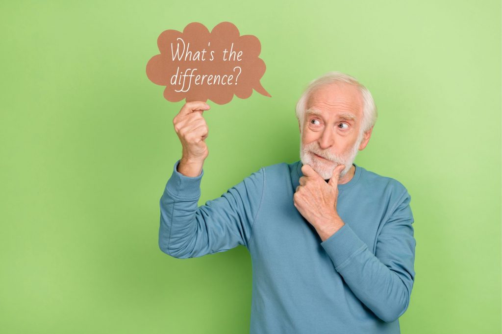 long-term care what's the difference sign held by man with beard