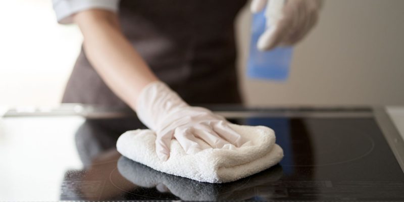 Housekeeping & Cleaning Services in Philly - Woman wiping a surface