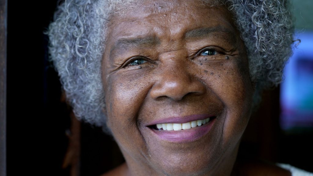 close up of African American senior woman smiling