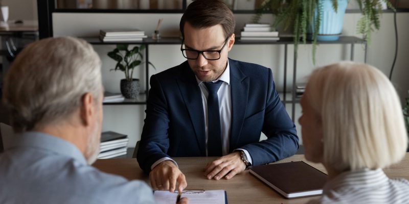 financial advisor and retired couple