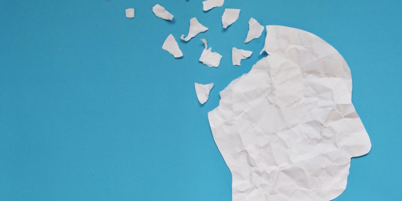 dementia artistic concept with paper trailing