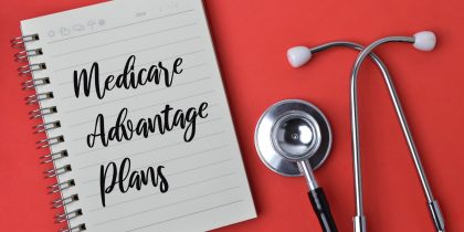 Medicare Advantage Plans written on a notebook