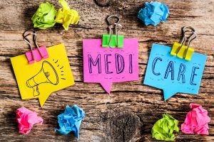 Medicare written on sticky notes
