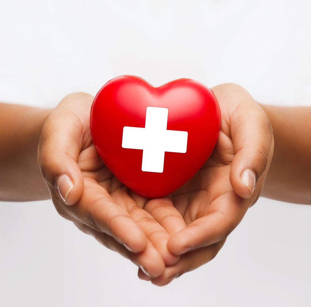 heart with medical cross in the middle