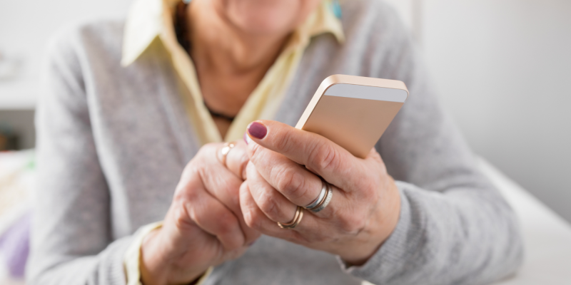 senior woman using cell phone
