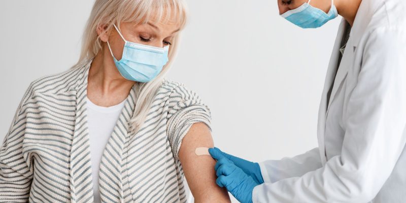 senior getting vaccine