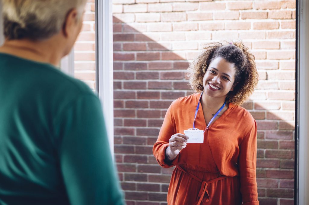 nurse with home health patient