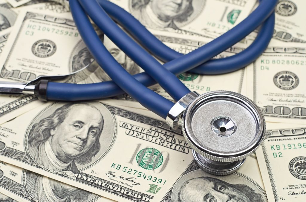 stethescope and money