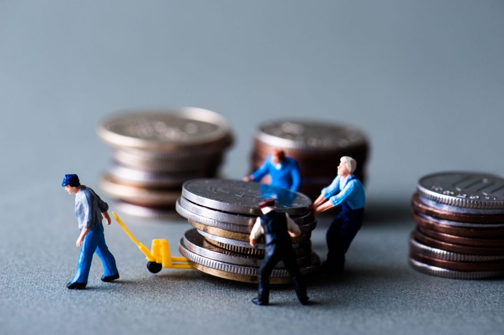 tax relief illustration, coins being carried away by people