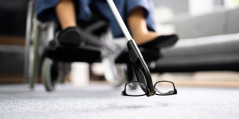 reacher grabber grabbing glasses from the floor
