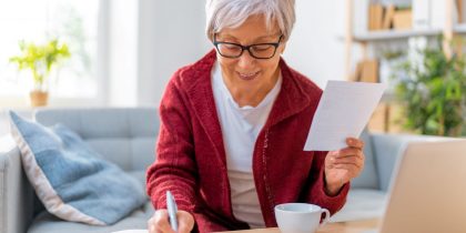 retiree doing bills