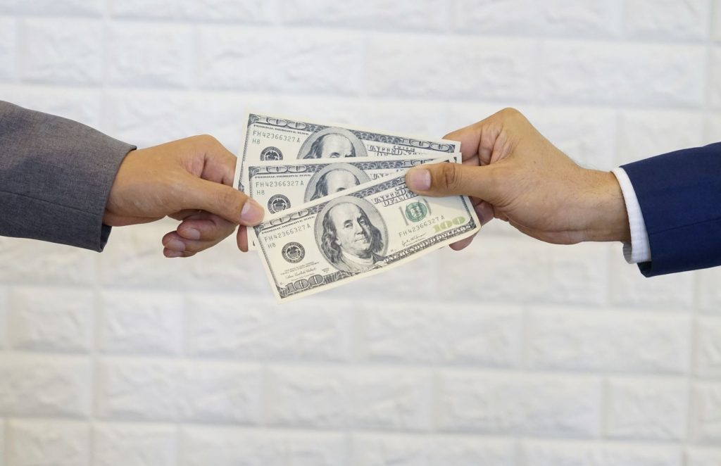 cash enchanging hands