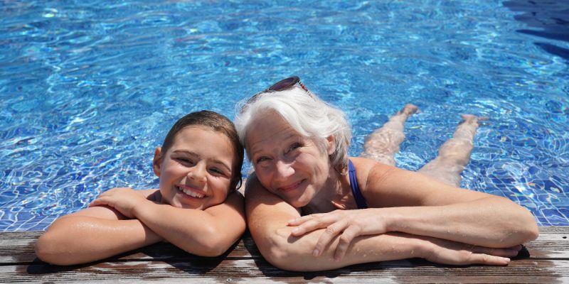 grandma and grandchild swimming