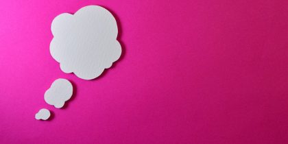 thought bubble on a pink background