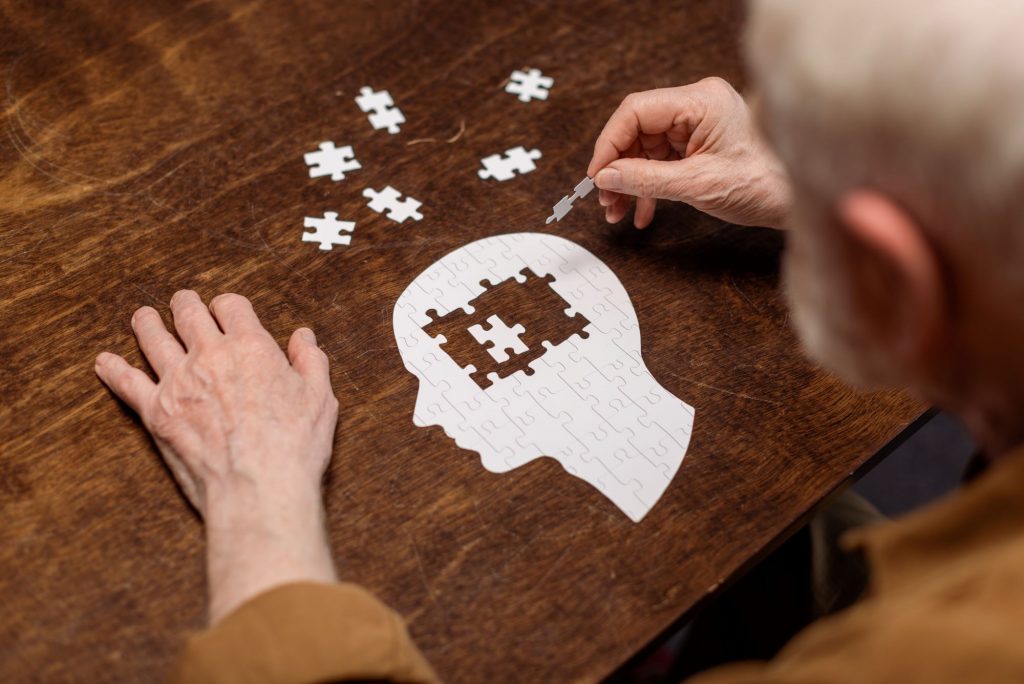 brain puzzle depicting alzheimer's and other forms of dementia