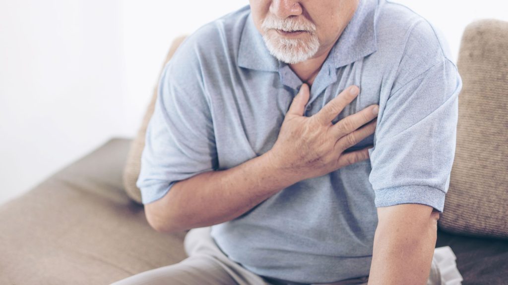 senior man with heartburn
