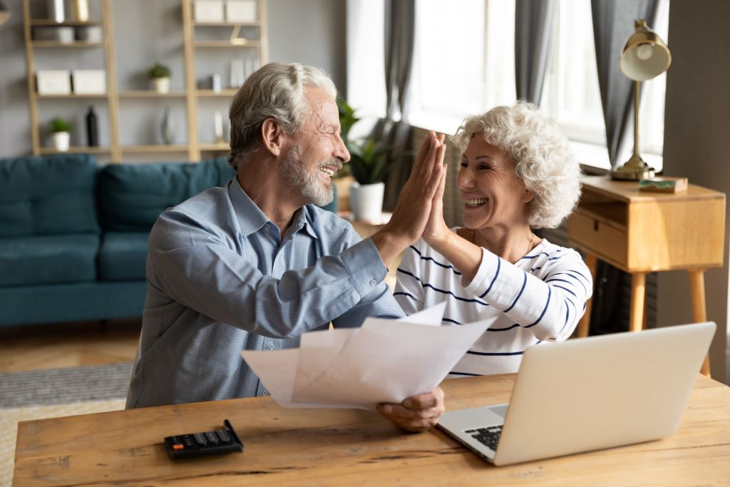 high-fiving seniors