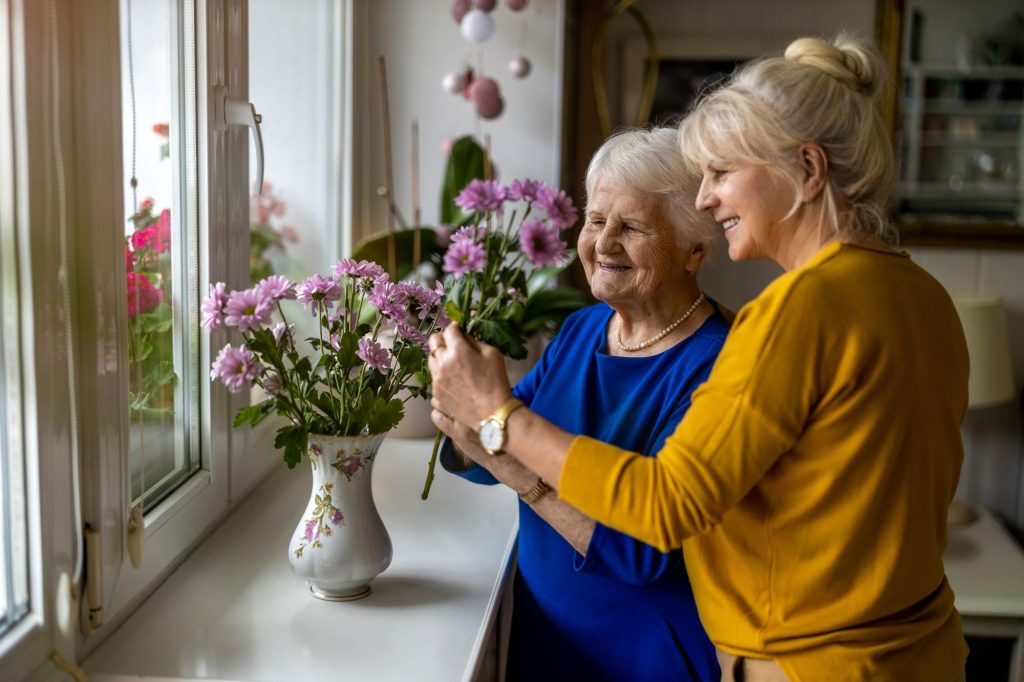 elderly mom and adult daughter