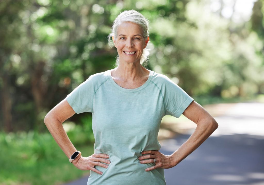 older lady running exercising outside
