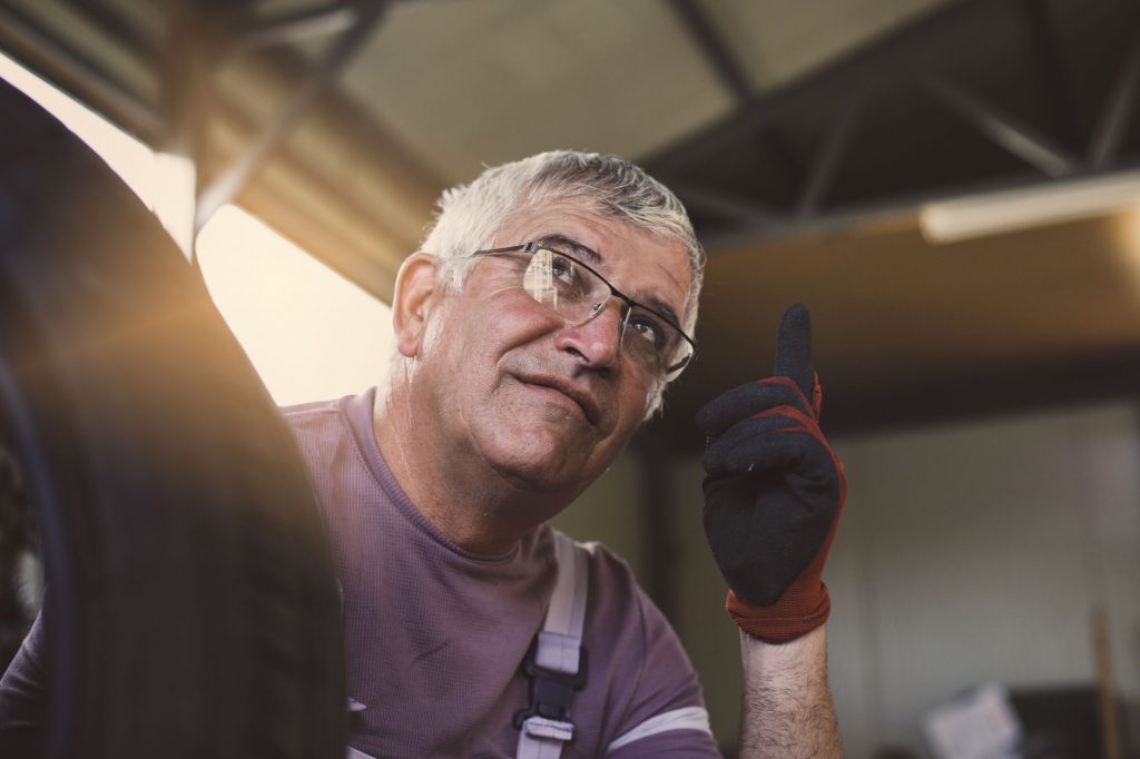 worker with tire