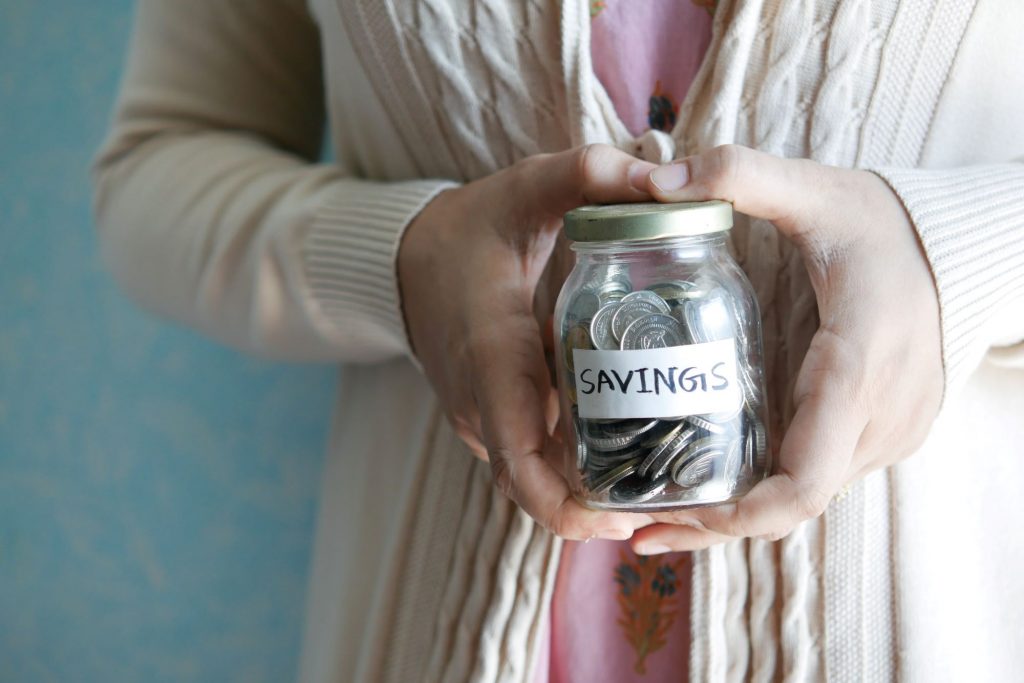 lady holding savings