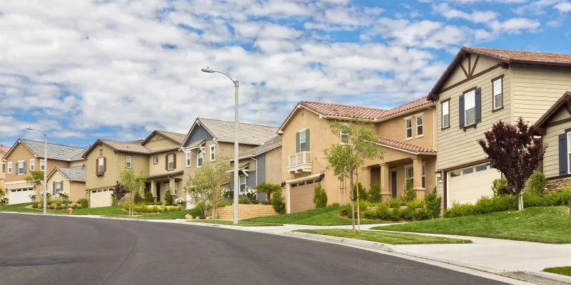 Homes in the suburbs are built on a hill, close together