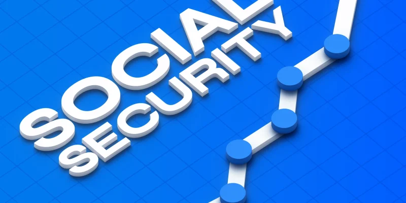 social security words on blue background with line graph chart