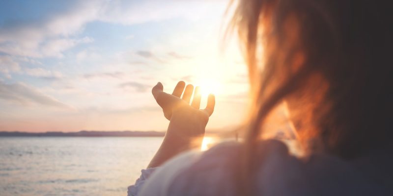 worshiping outside in sunny area
