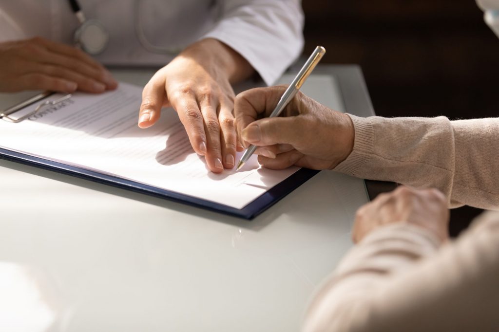 writing, signing a legal document