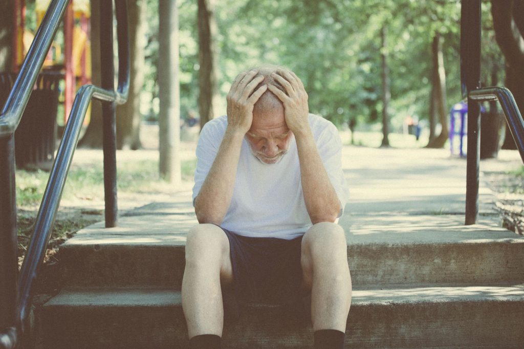 hands on head depressed