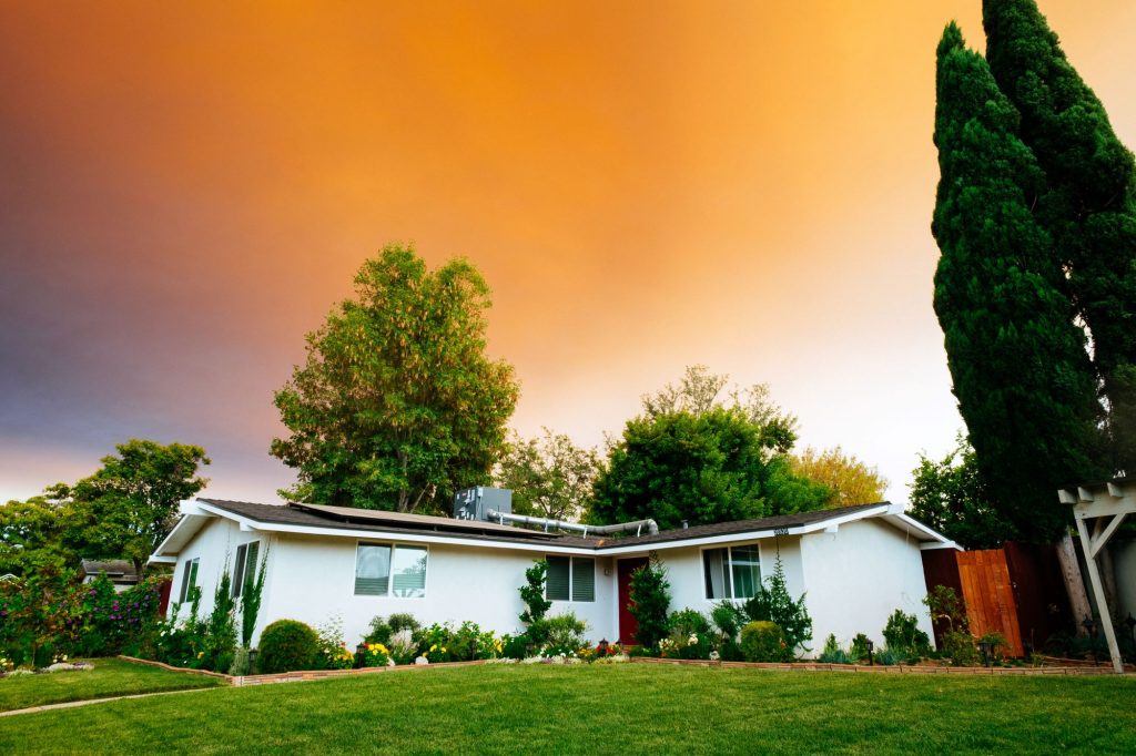 house amid orange sky