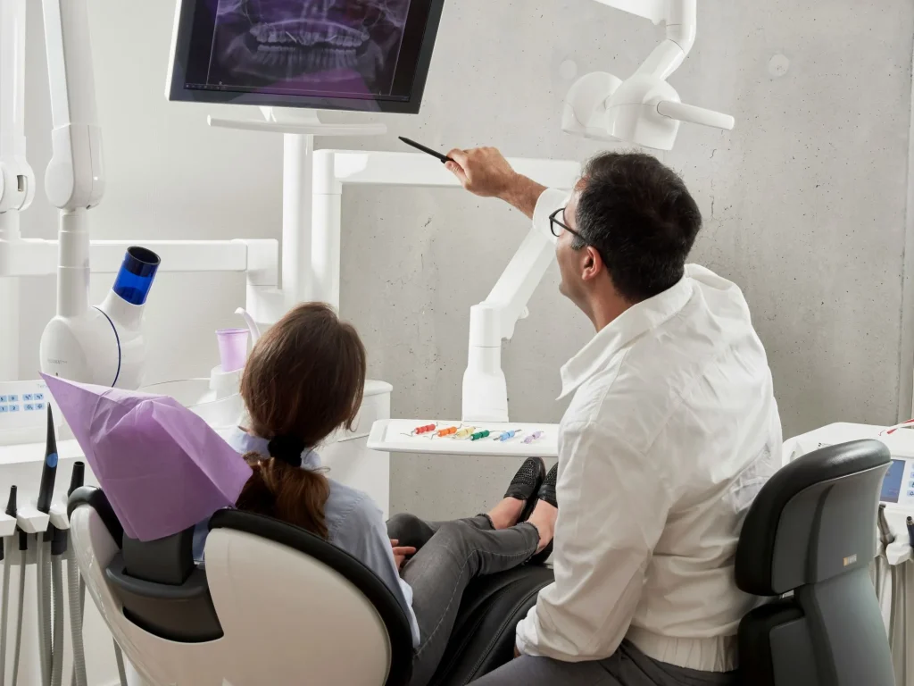 dentist explaining care to a patient