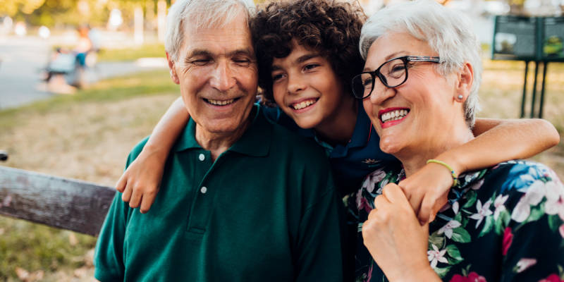 grandchildren and grandparents smiling together