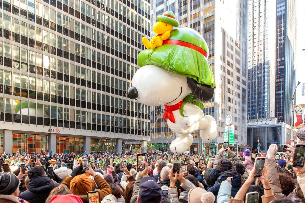 Manhattan, New York - November 2023 ride on the Snoopy float at the 2023 Macy's Thanksgiving Day Parade on November 23th, 2023 in New York City.